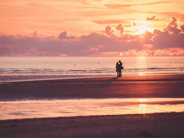 Par På Stranden Solnedgang
